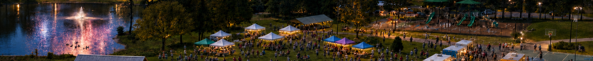 Image of Shamrock Park and lake, fireworks, tents, vendors, stage people