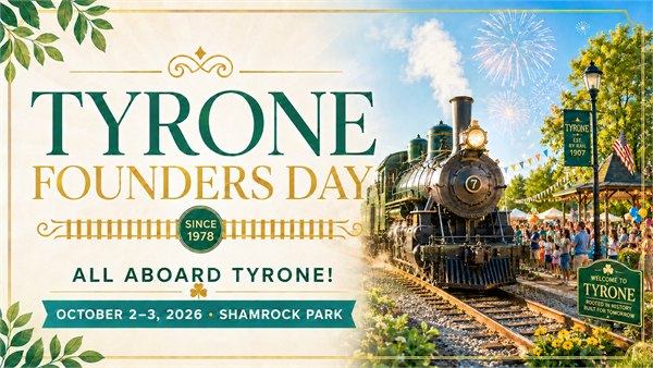 Tyrone Founders Day banner with train, track and depot